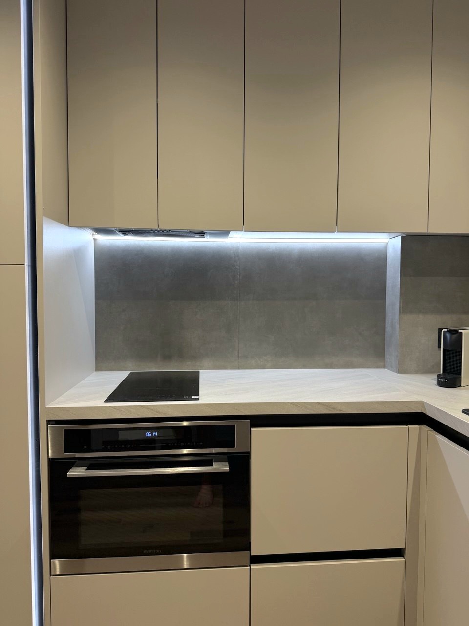 Kitchen with built-in oven and induction hob