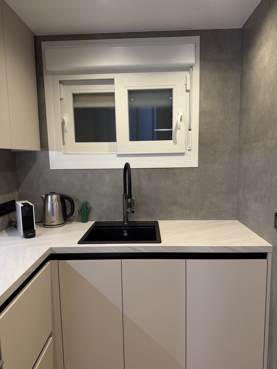 Sleek kitchen cabinetry and worktop
